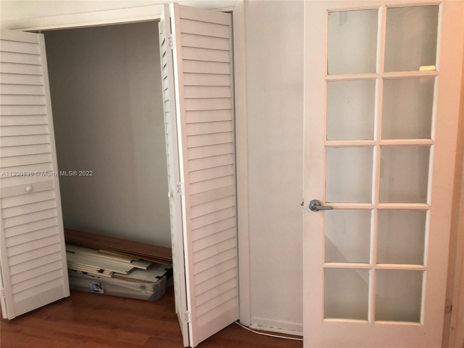 250 Gate Road, Unit 153 Hollywood, FL 33024 - Photo 11 of 19 a view of a hallway with closet