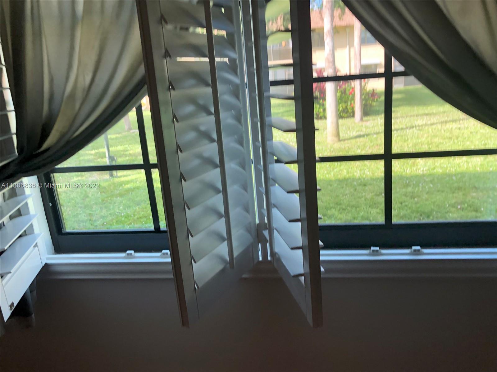 250 Gate Road, Unit 153 Hollywood, FL 33024 - Photo 16 of 19 a view of outdoor space and balcony