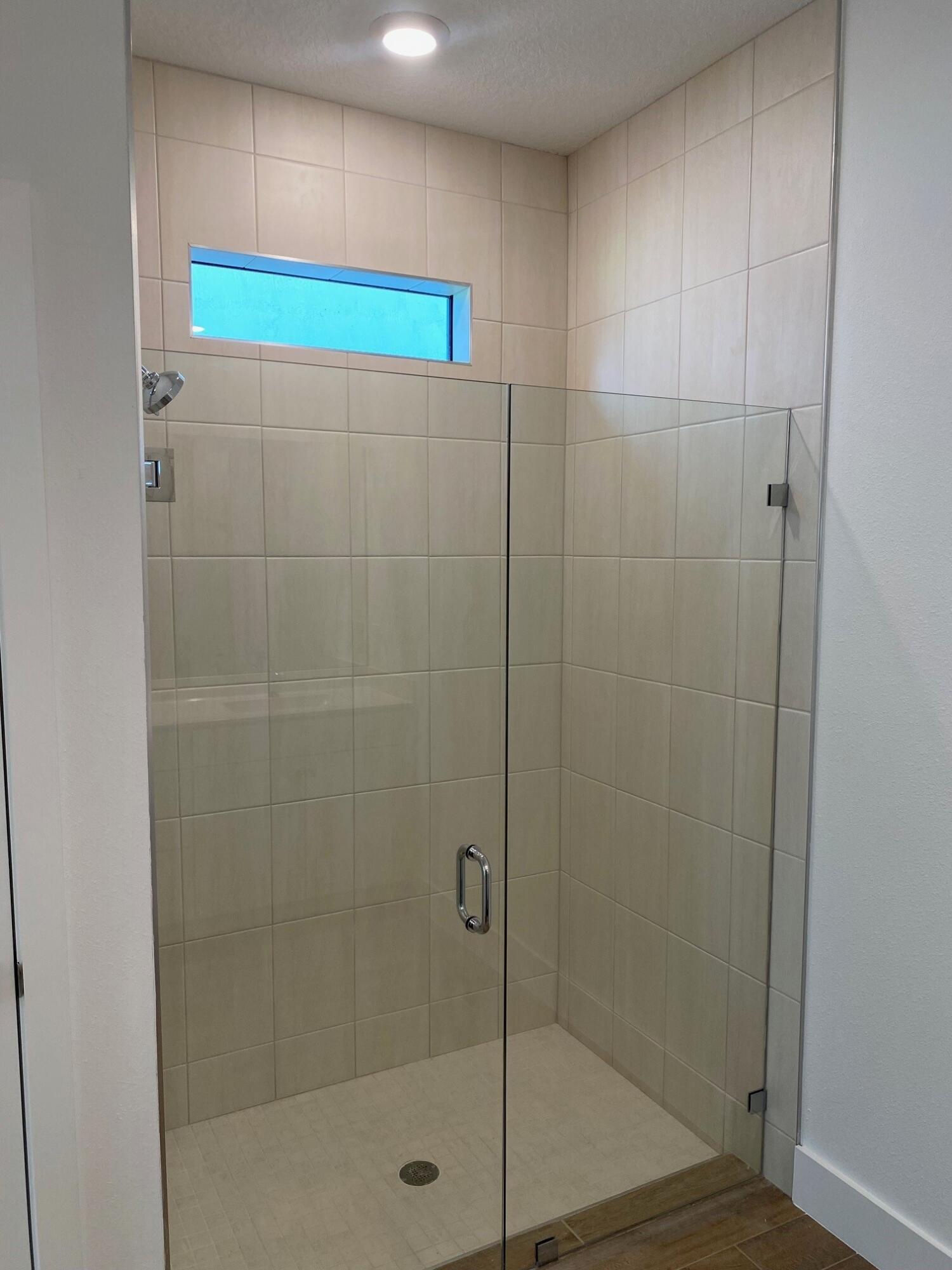 6840 Southeast Park Trace Drive Stuart, FL 34997 - Photo 14 of 18 PPT 42 PRIMARY BATH SHOWER