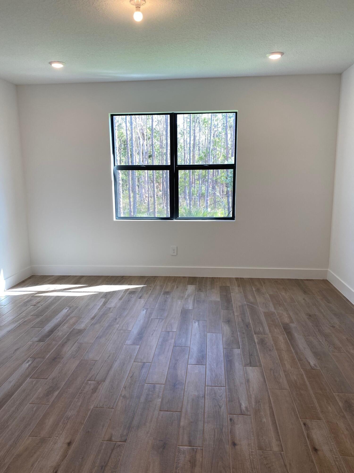 6840 Southeast Park Trace Drive Stuart, FL 34997 - Photo 16 of 18 PPT 42 PRIMARY BEDROOM