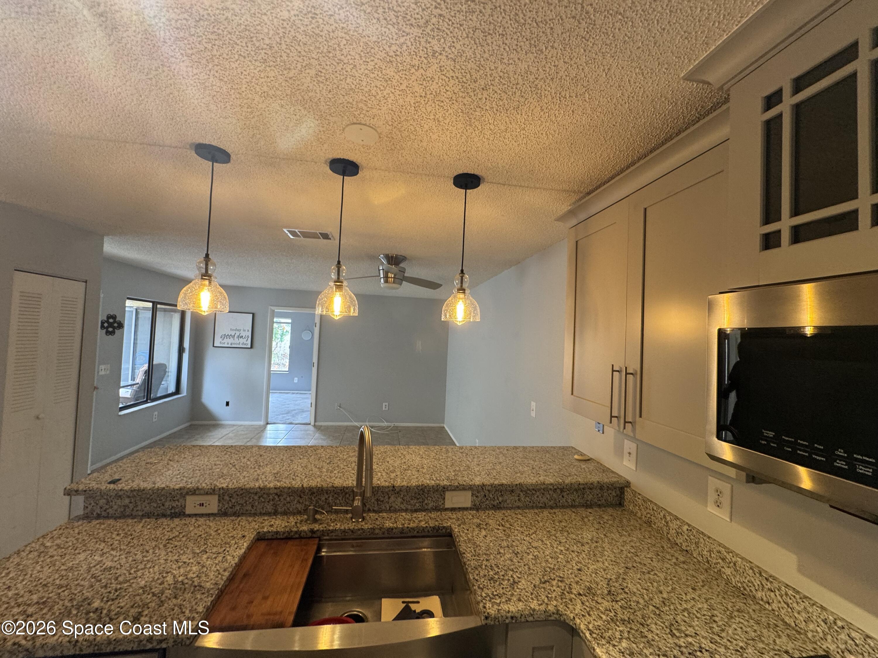 1471 Sheafe Avenue Northeast, Unit 103 Palm Bay, FL 32905 - Photo 8 of 25 IMG_3499