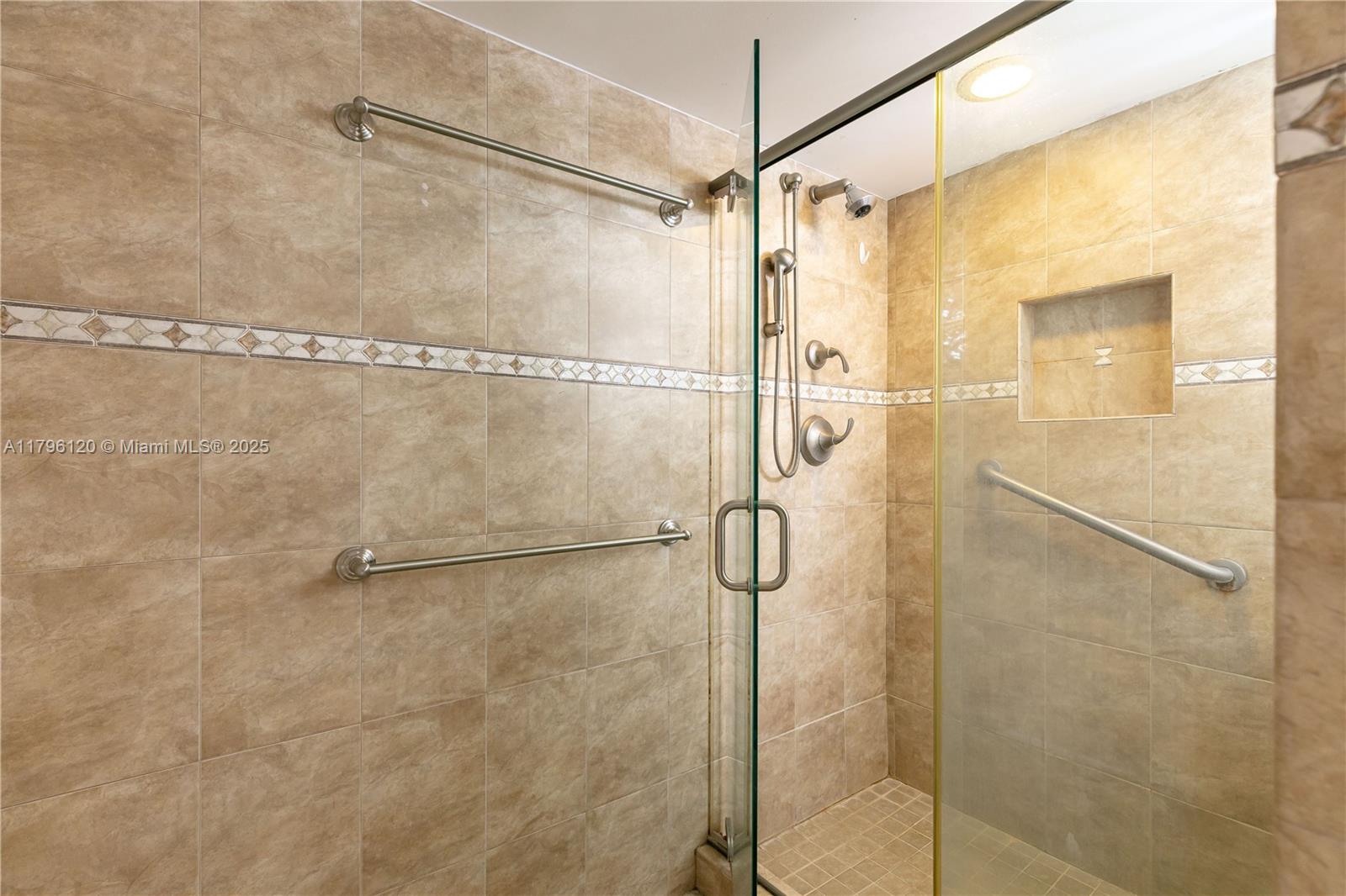 2101 South Ocean Drive, Unit 606 Hollywood, FL 33019 - Photo 11 of 58 a bathroom with a shower