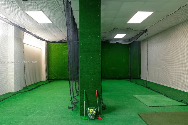 a room with furniture and pool table