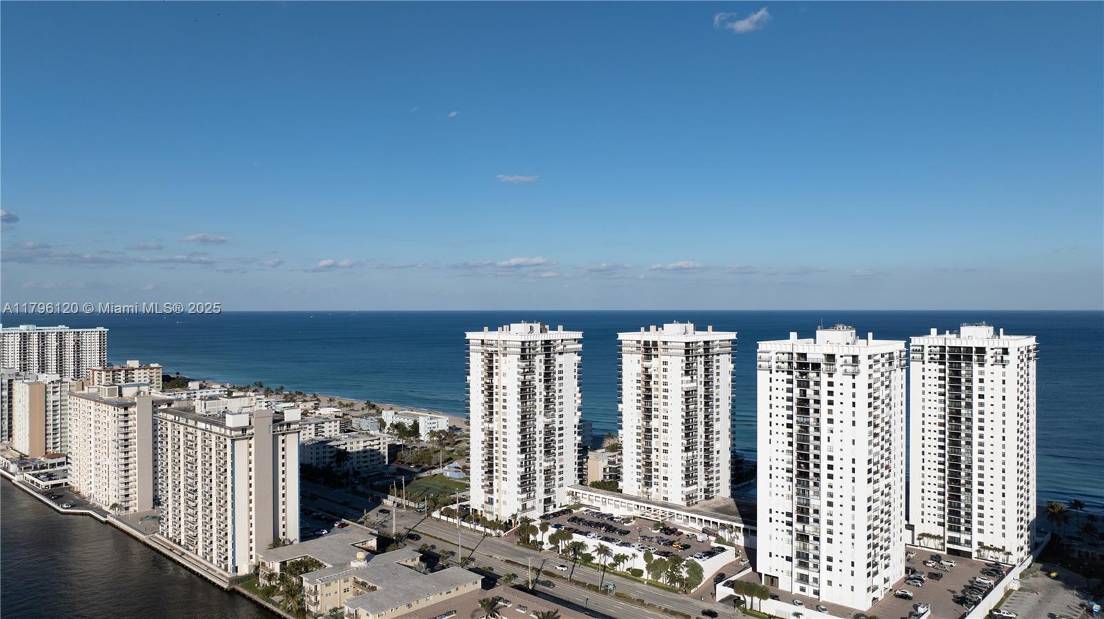 2101 South Ocean Drive, Unit 606 Hollywood, FL 33019 - Photo 54 of 58 a living room with furniture and a floor to ceiling window
