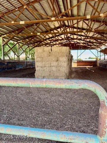 a view of a yard with an outdoor space