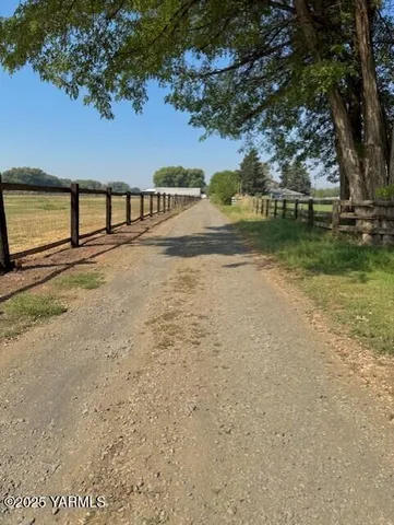 a view of swimming pool with a yard