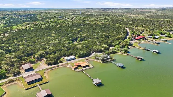 an aerial view of residential house with outdoor space