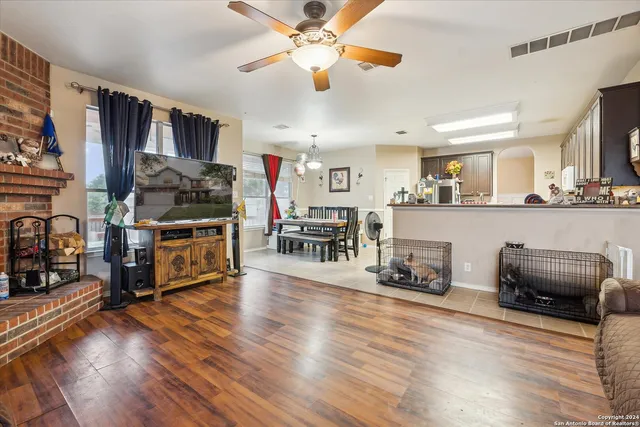 a dining room with furniture and window