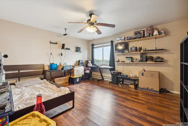a view of a bedroom with a bed and closet