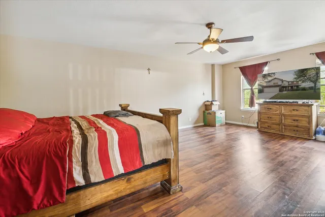 a large bathroom with a double vanity sink and a mirror