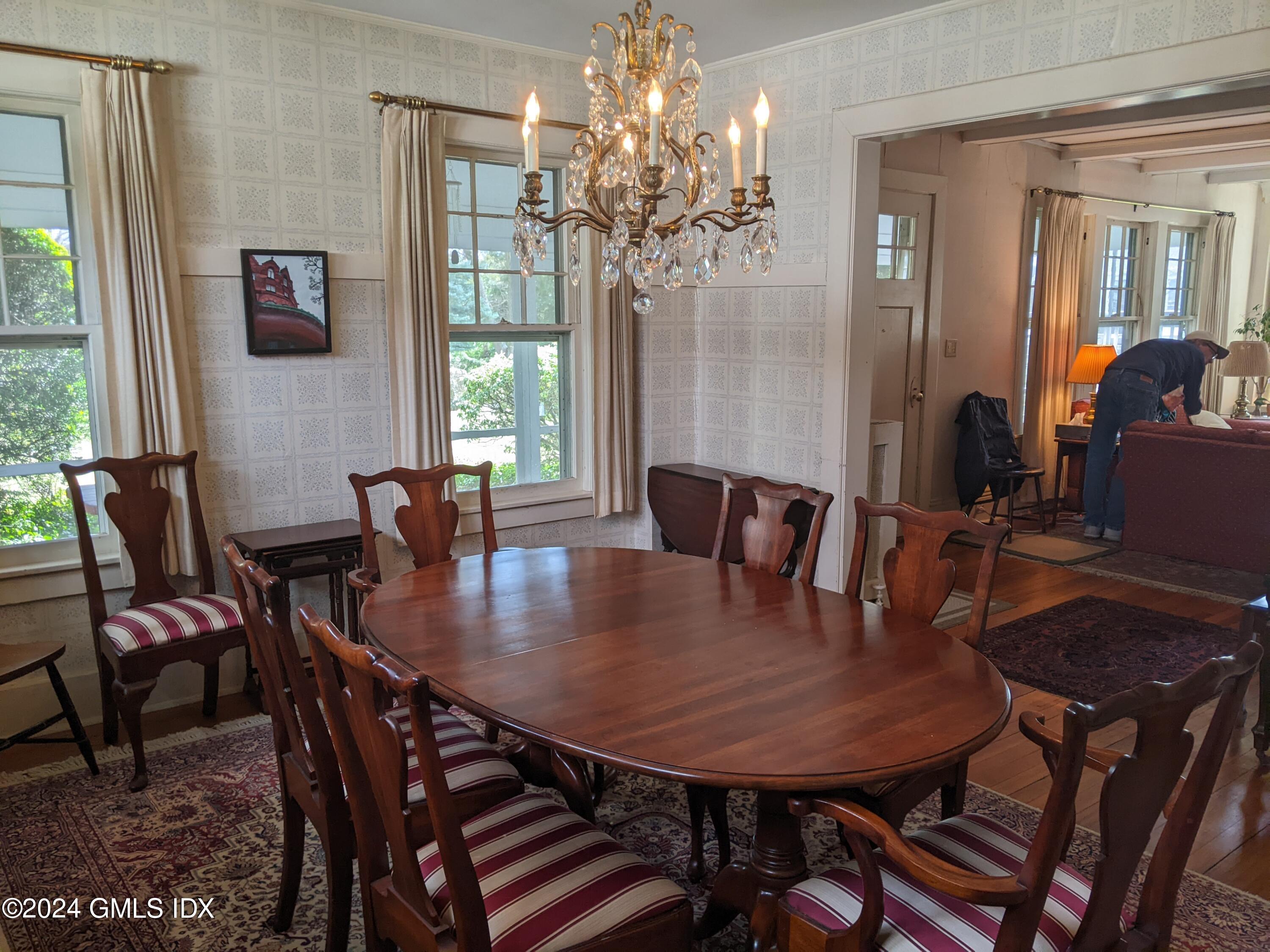 23 Ballwood Road Old Greenwich, CT 06870 - Photo 12 of 27 a view of a dining room with furniture and window