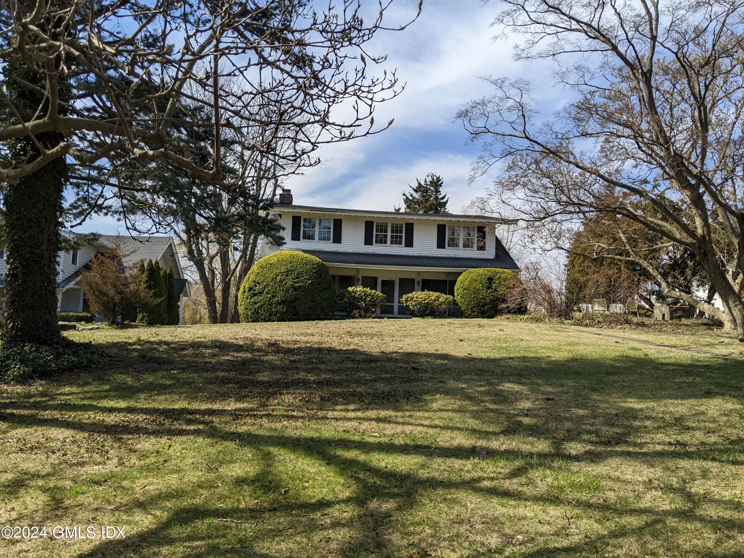 23 Ballwood Road Old Greenwich, CT 06870 - Photo 2 of 27 a view of a house with a yard