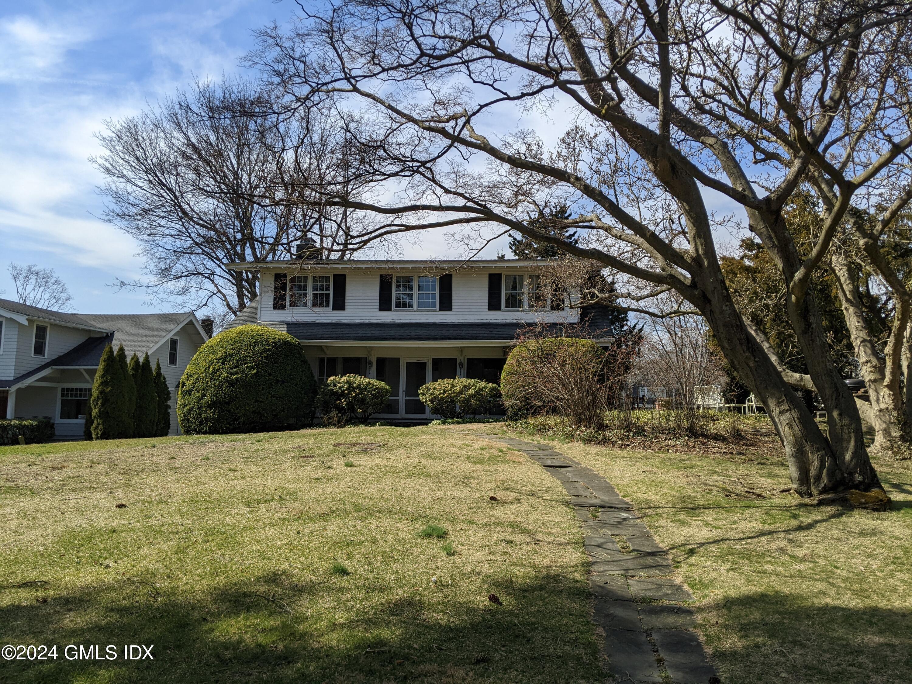 23 Ballwood Road Old Greenwich, CT 06870 - Photo 26 of 27 a view of a house with a yard