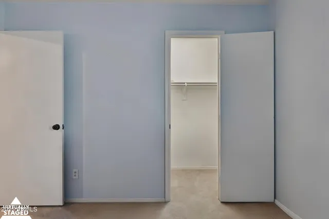 a bathroom with a sink toilet vanity and tub