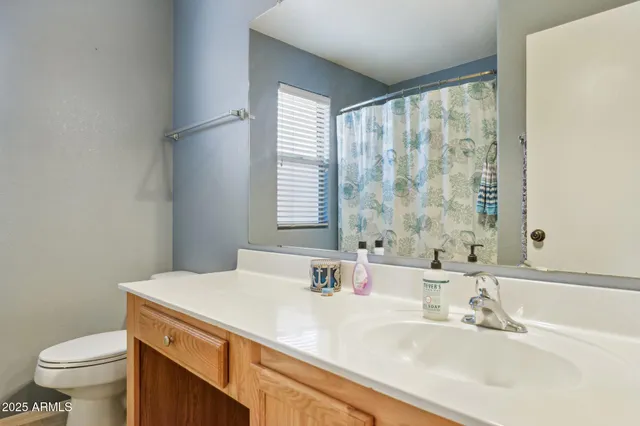 a bedroom with a bed and closet