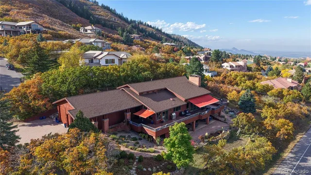 a bathroom with a granite countertop sink mirror and a bathtub