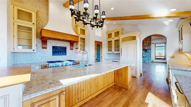 a view of a living room with a large window