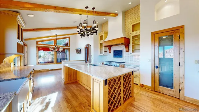 a bathroom with a sink a mirror and a bathtub