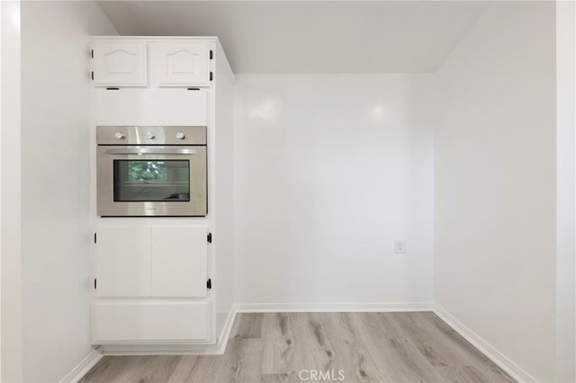 a kitchen sink sitting next to a window