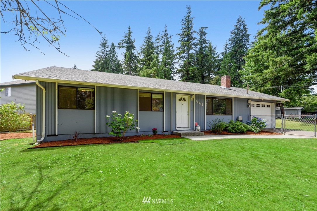 19910 Filbert Drive Bothell, WA 98012 - Photo 1 of 16 front view of a house with a yard