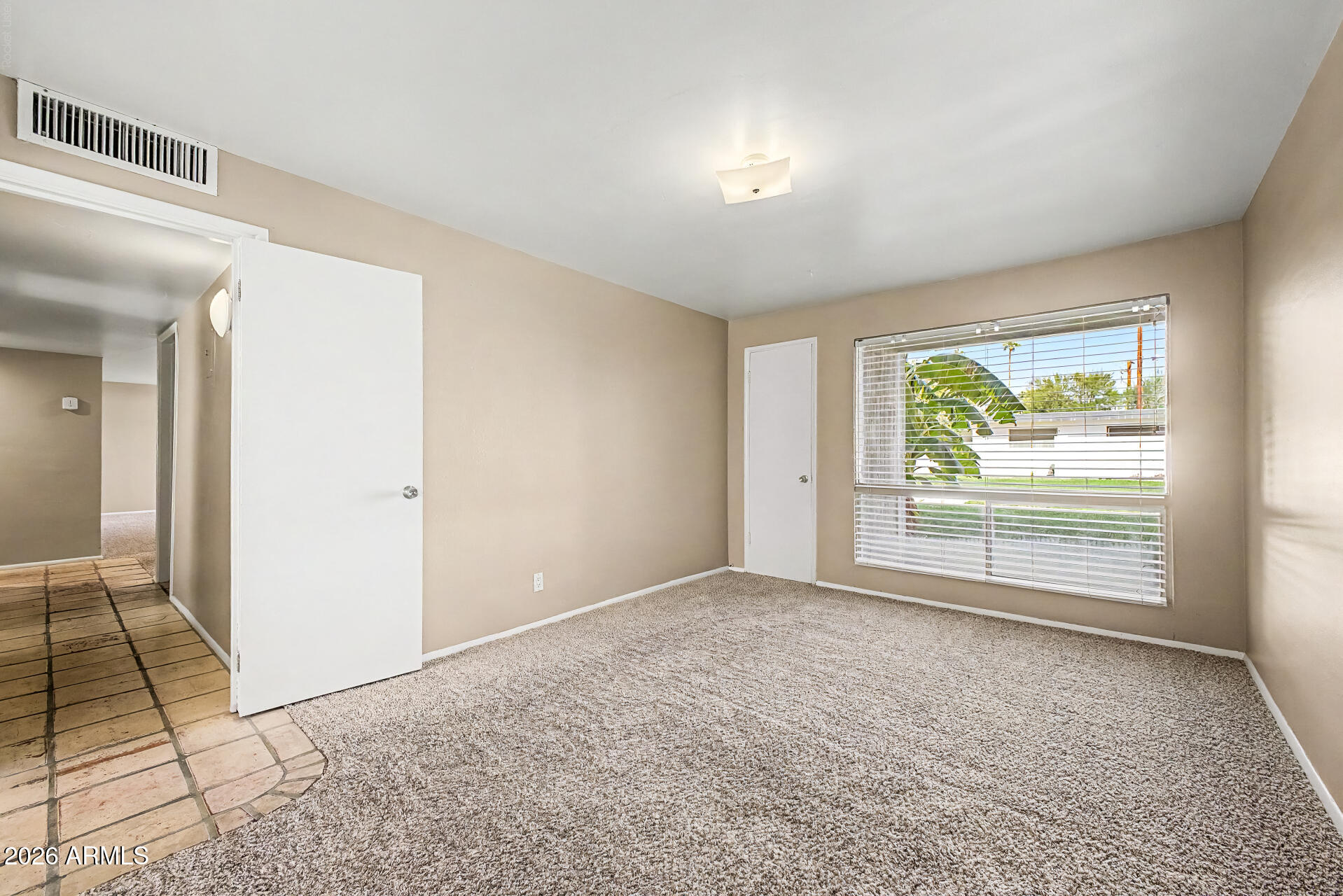 3270 East Camelback Road, Unit 114 Phoenix, AZ 85018 - Photo 12 of 31 Primary Bedroom