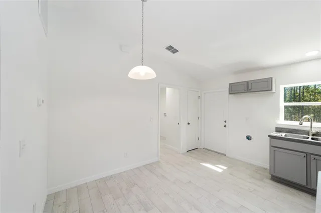 a view of a kitchen with dishwasher and a stove