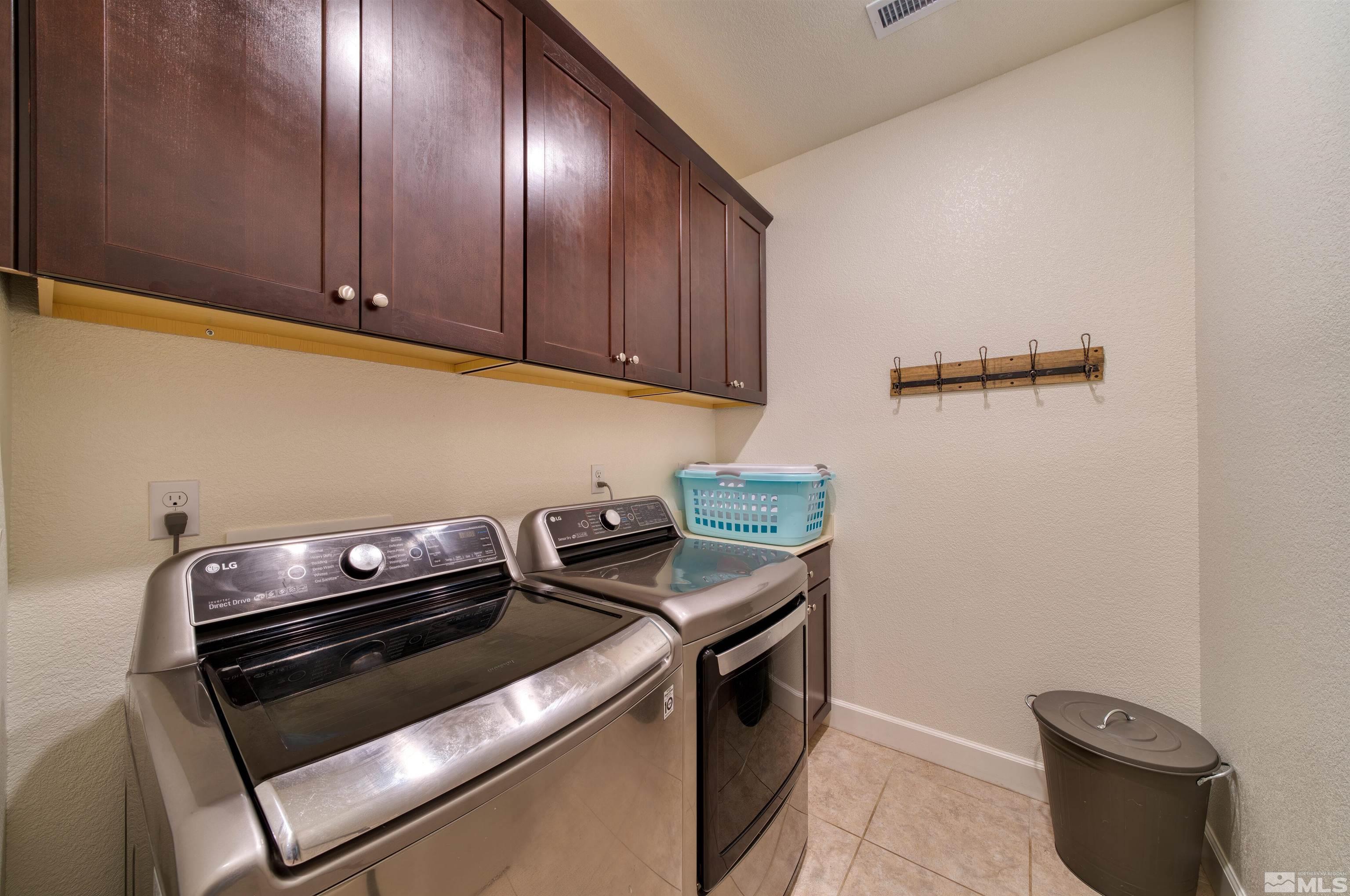 9784 Quartette Drive Reno, NV 89521 - Photo 16 of 18 a close view of a stove and wooden floor