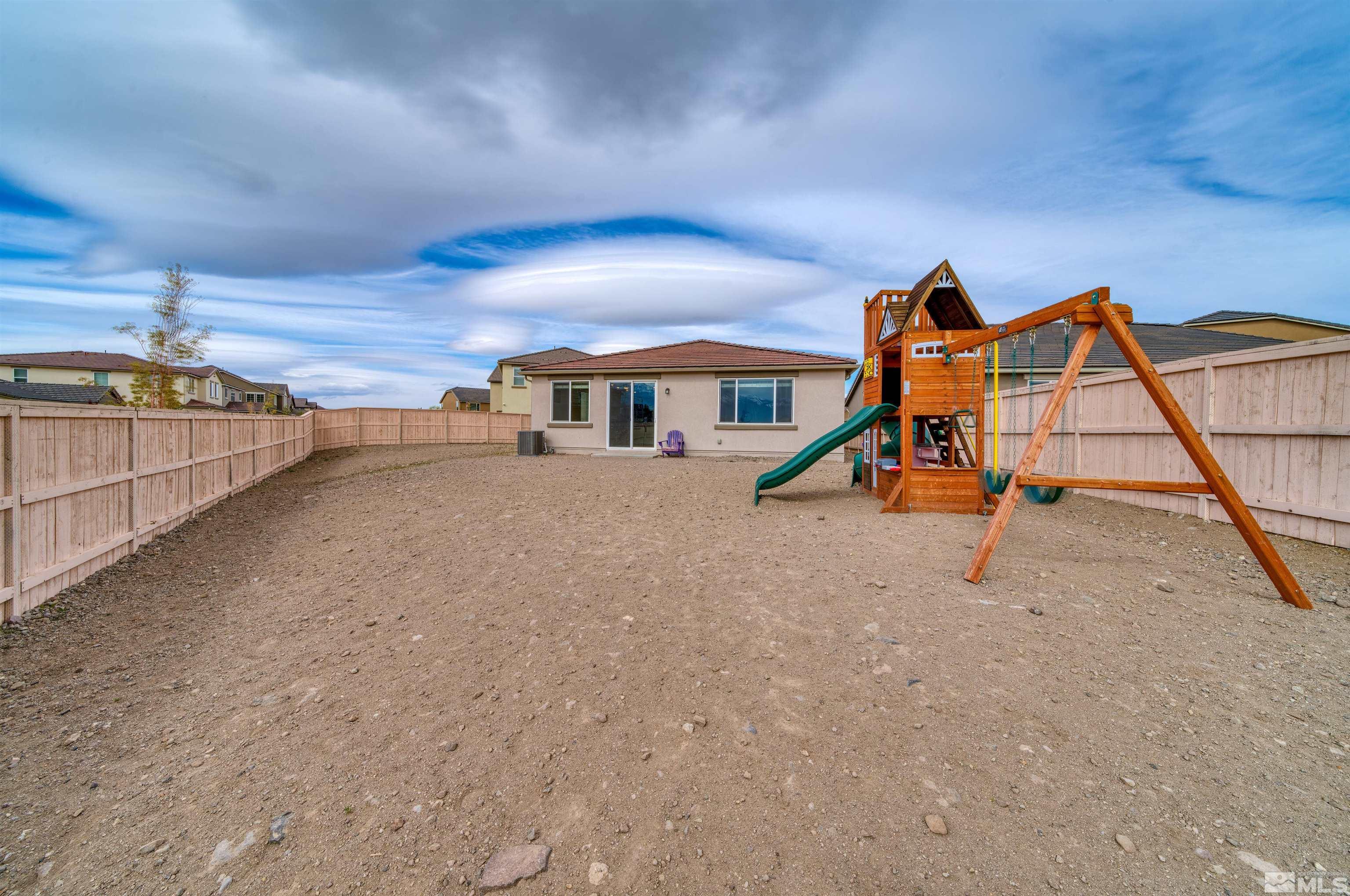 9784 Quartette Drive Reno, NV 89521 - Photo 3 of 18 a view of a hall with a slide
