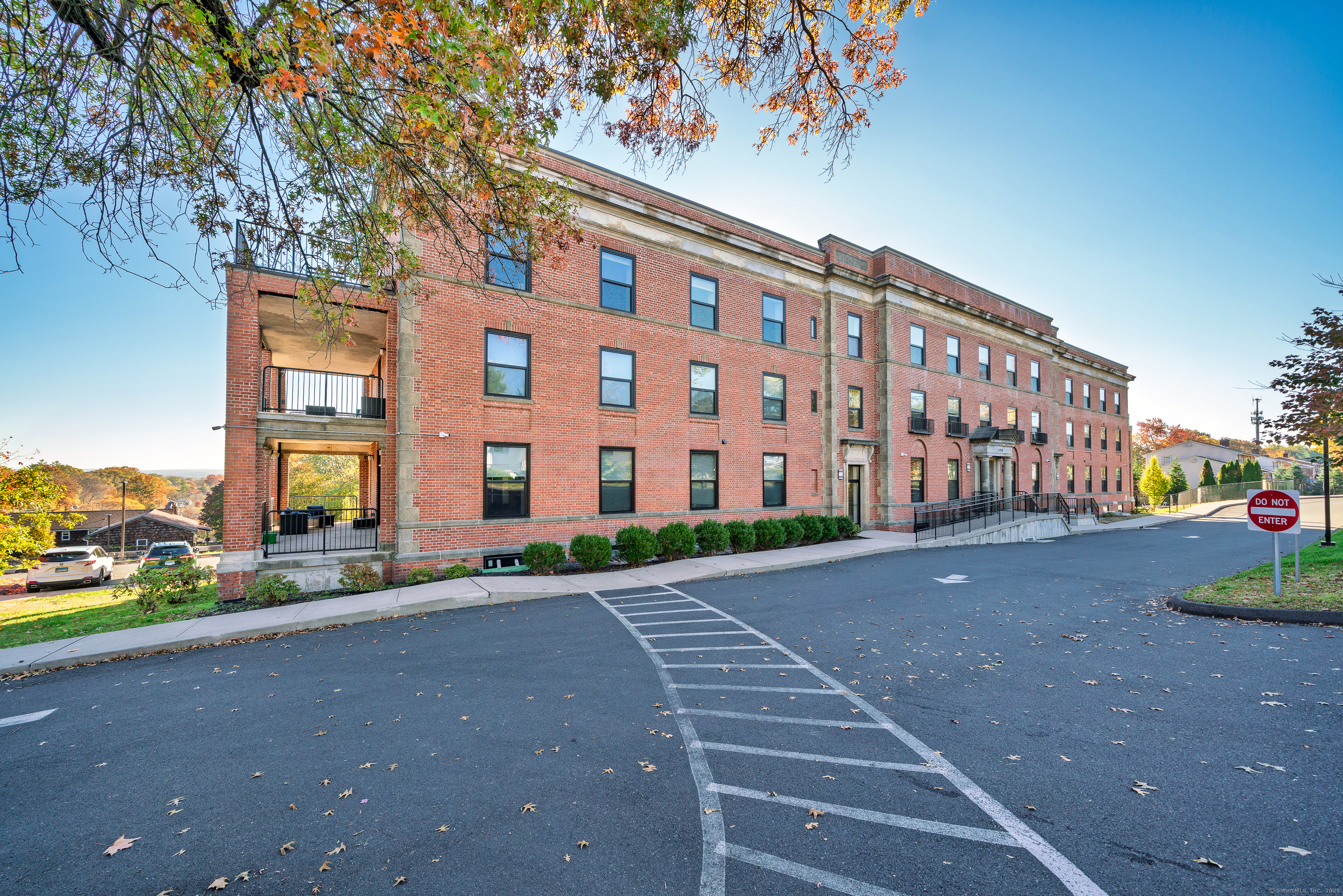 170 Ridge Road, Unit 304 Wethersfield, CT 06109 - Photo 1 of 25 a view of a building with a street