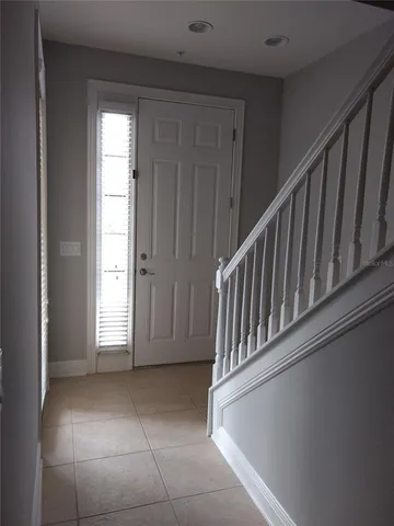 a view of entryway with stairs