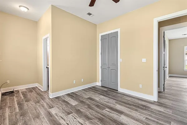 a view of a livingroom with wooden floor