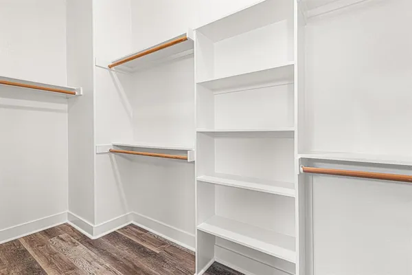 a view of an empty walk in closet