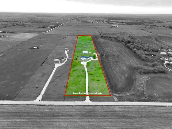 a view of a yard with an outdoor space