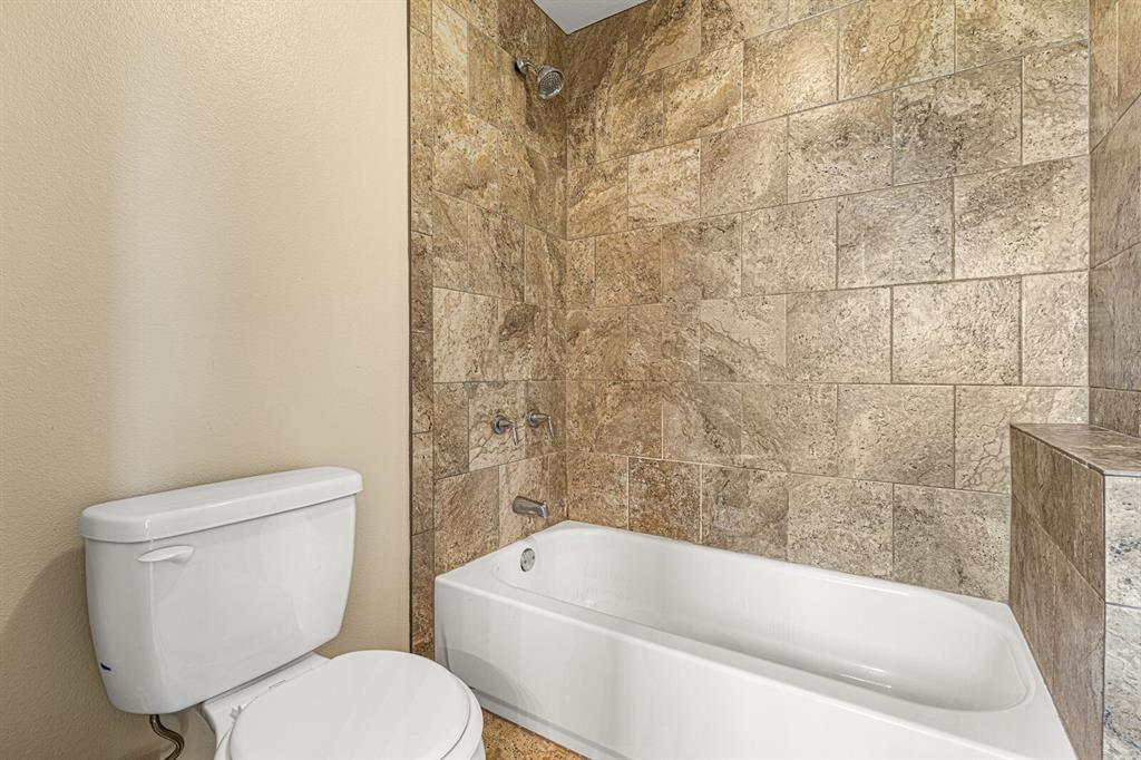 10160 Wallace Road Holland, TX 76534 - Photo 8 of 40 Bathroom featuring shower combination and toilet