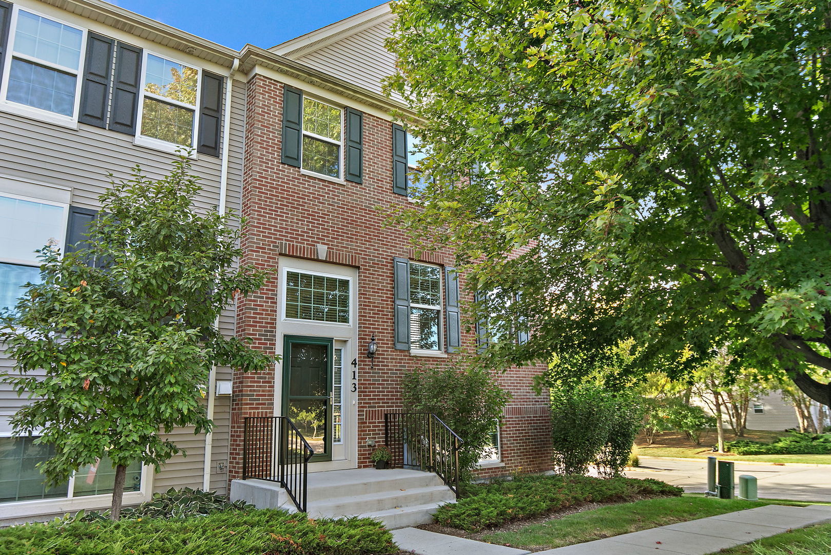 413 Town Center Boulevard Gilberts, IL 60136 - Photo 1 of 34 front view of a house with a yard