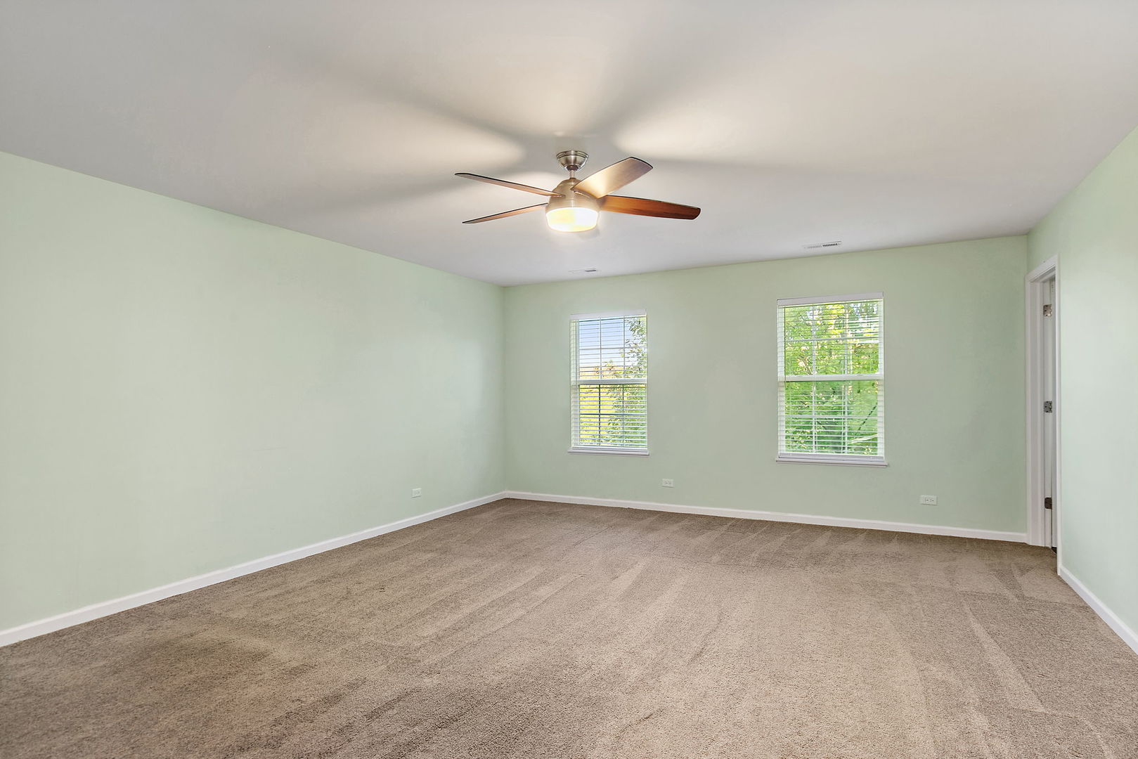 413 Town Center Boulevard Gilberts, IL 60136 - Photo 19 of 34 a view of room with a ceiling fan and window