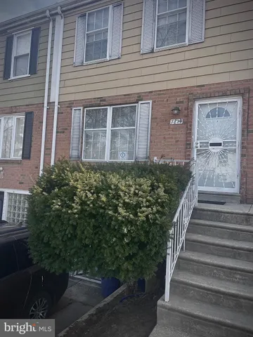 a view of a house with plants