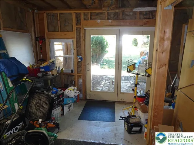 a room with furniture and a window