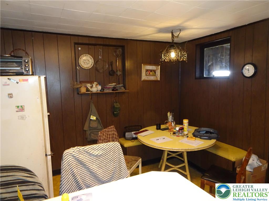 313 East Church Street Bethlehem, PA 18018 - Photo 8 of 27 a dining room with furniture and chandelier