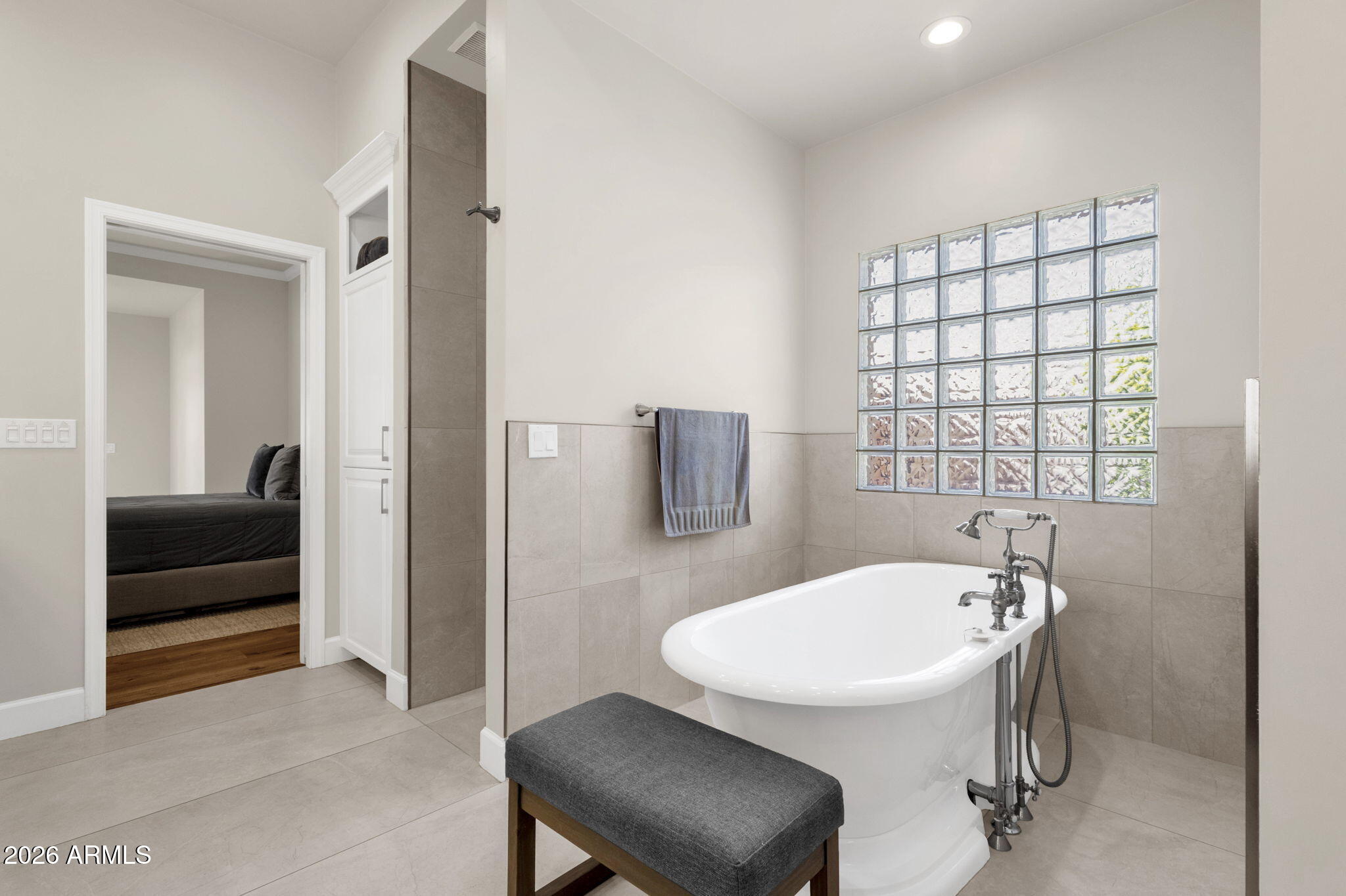 4139 East Colter Street Phoenix, AZ 85018 - Photo 27 of 58 a bathroom with a sink and a mirror