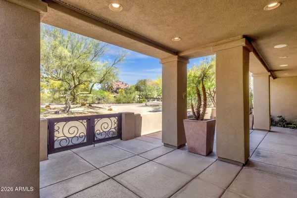an aerial view of a house with outdoor space