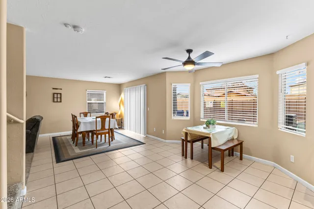 a kitchen with a sink a stove and cabinets