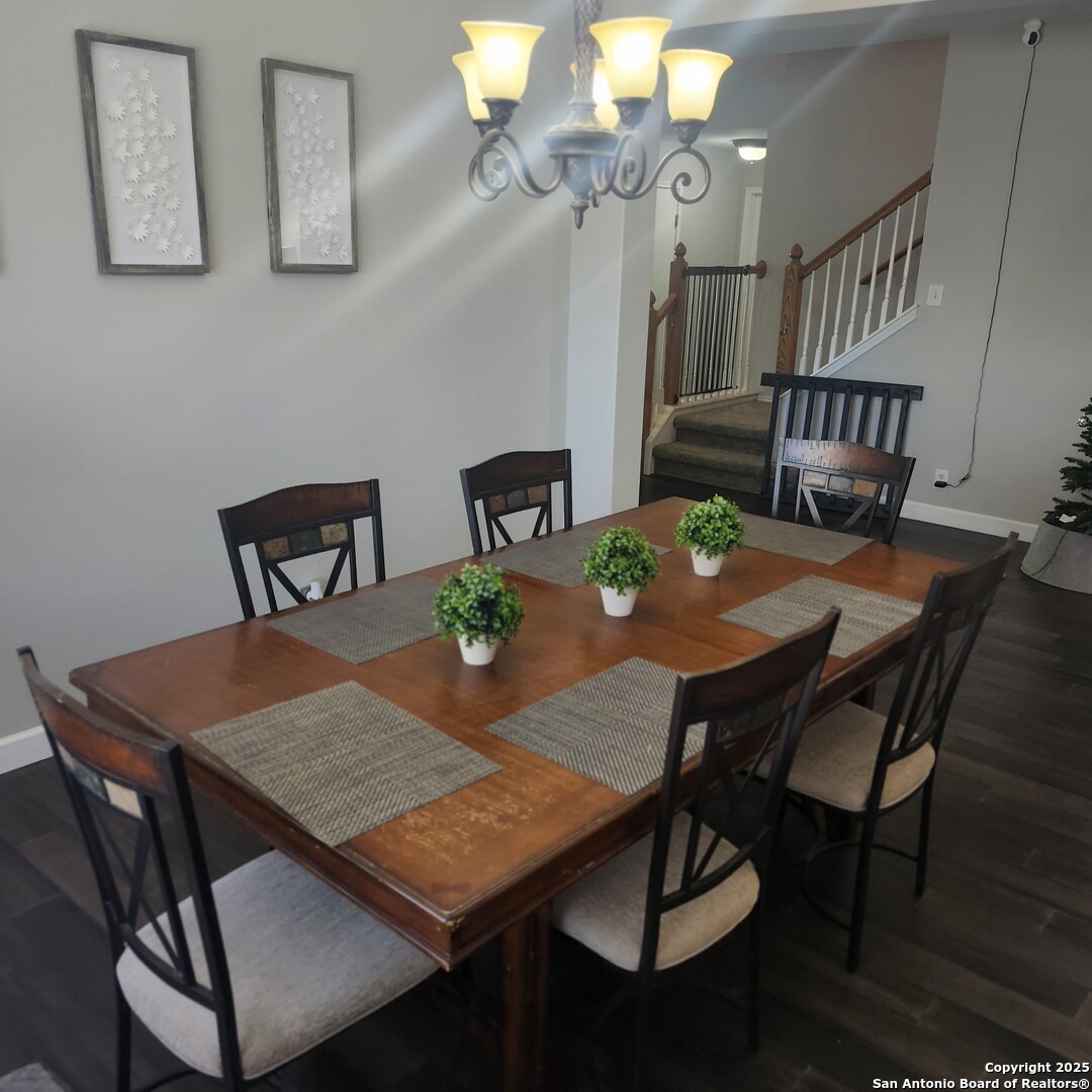 9402 Anderson Way Converse, TX 78109 - Photo 14 of 37 a view of a dining room with furniture and wooden floor