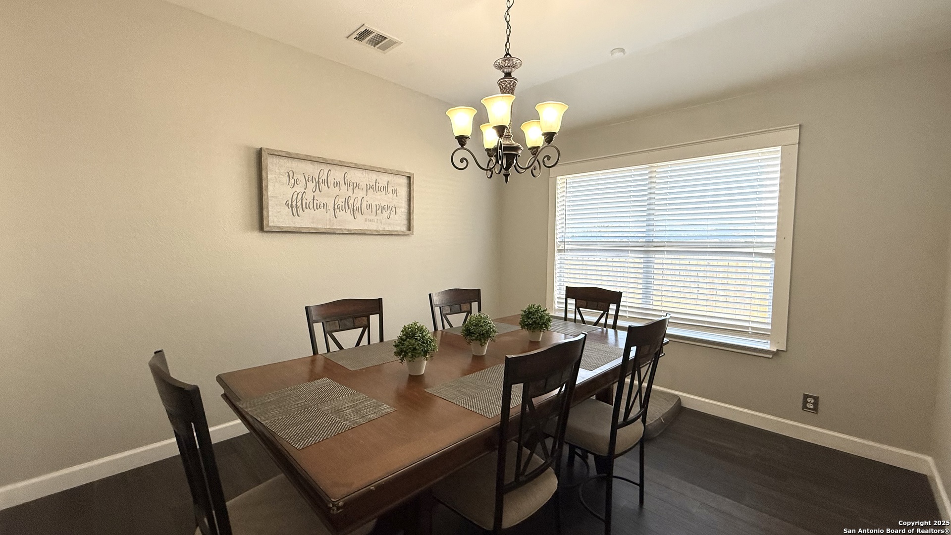 9402 Anderson Way Converse, TX 78109 - Photo 15 of 37 a view of a dining room with a table and chairs