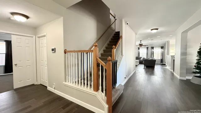 a view of entryway with wooden floor