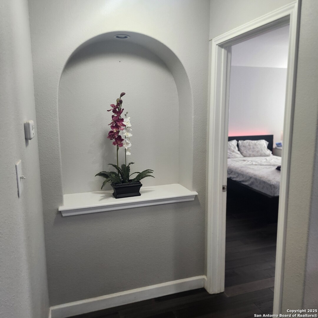 9402 Anderson Way Converse, TX 78109 - Photo 23 of 37 a view of a hallway with a potted plant
