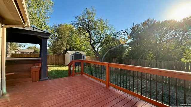 a front view of a house with a yard table and chairs