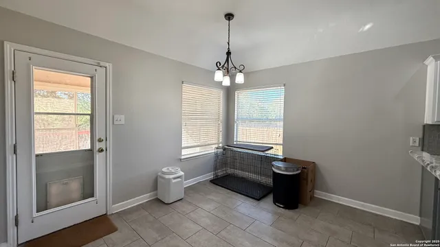 a kitchen with stainless steel appliances granite countertop a stove and a sink
