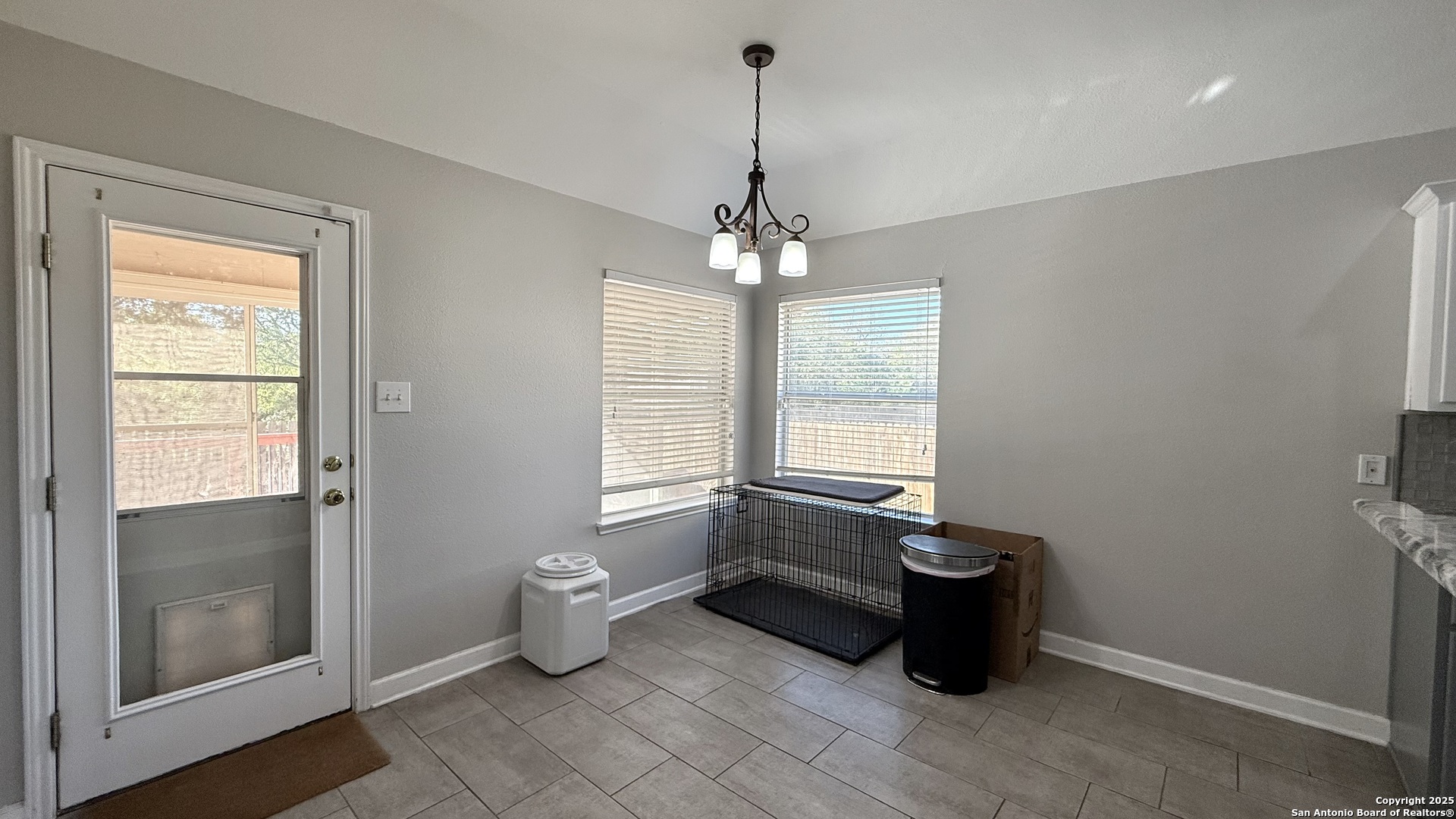 9402 Anderson Way Converse, TX 78109 - Photo 7 of 37 a room with hard wood floor and window