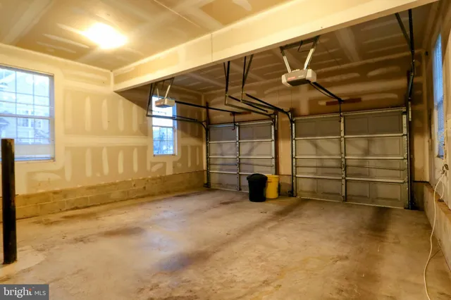 a view of a room with wooden walls